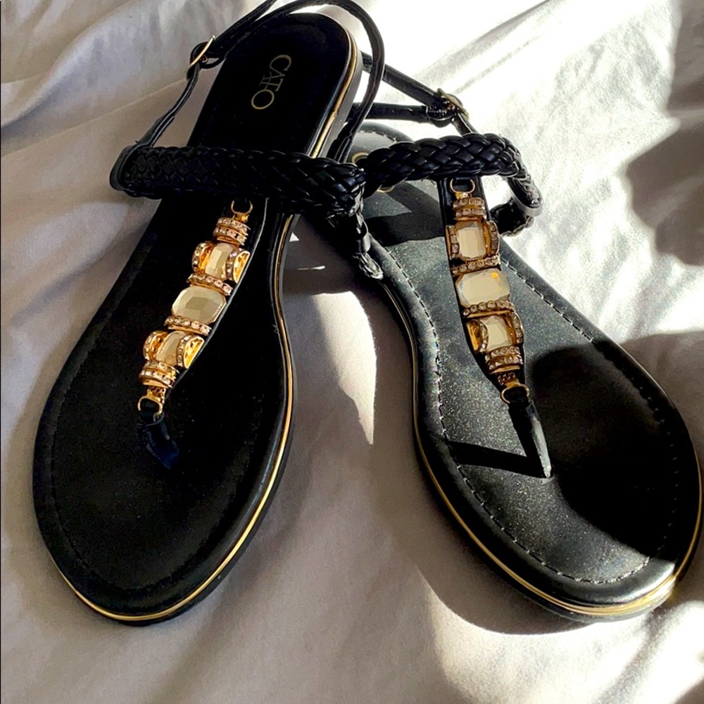 Black sandals.
